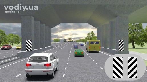 Вертикальна дорожня розмітка 2.1.1 та 2.1.3 — позначення торцевих частин штучних споруд, опор шляхопроводів та парапетів на дорозі з автомобілями.