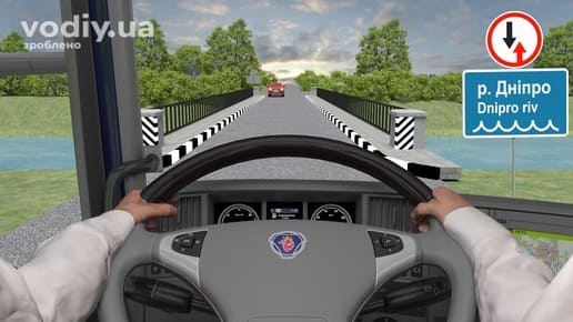 Зустрічний роз'їзд на вузькому мосту, дорожній знак 2.5 «Перевага зустрічного руху», червоний автомобіль на зустрічній смузі.