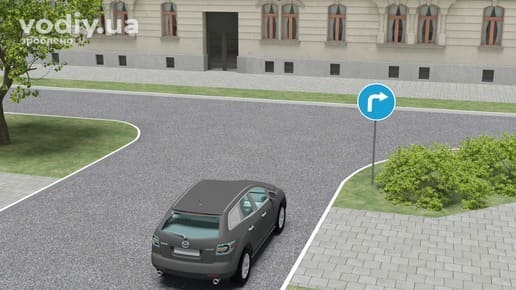 Дорожній знак 4.2 «Рух праворуч», автомобіль перед Т-подібним перехрестям, край проїзної частини. Дозволені напрямки руху на перехресті.