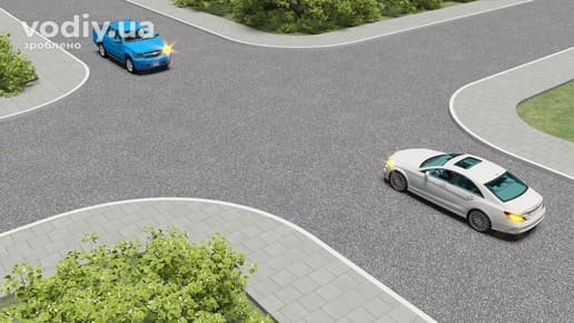 Черговість проїзду рівнозначного перехрестя, два автомобілі повертають ліворуч одночасно