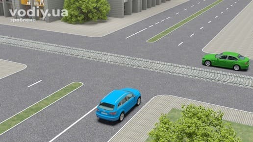 Синій та зелений автомобілі на рівнозначному перехресті без знаків, черговість проїзду за правилом правої руки.