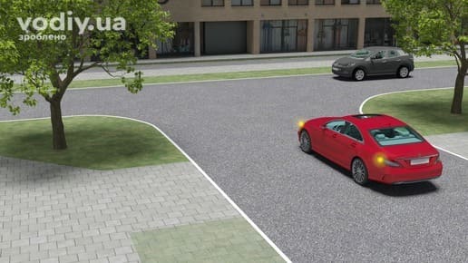 Червоний та сірий автомобілі на рівнозначному Т-подібному перехресті, правило правої руки, край проїзної частини.