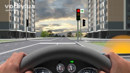 Червоний сигнал світлофора з табличкою із зеленою стрілкою праворуч, увімкнений покажчик повороту автомобіля перед перехрестям у місті.