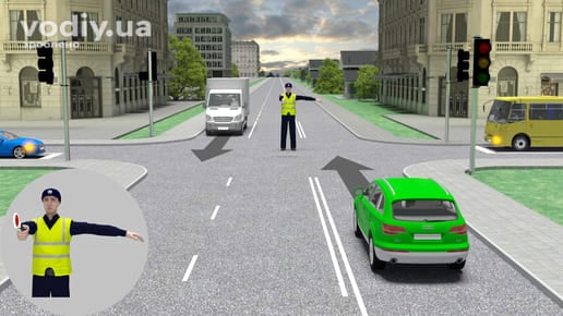 Регулювальник на перехресті, права рука витягнута вперед, автобус, вантажівка та легкові автомобілі перед світлофорами.