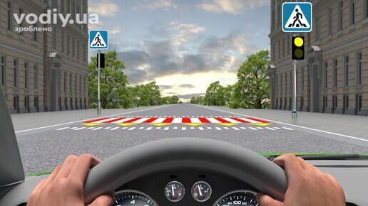 Дорожні знаки 5.38.1, 5.38.2 «Пішохідний перехід», жовтий сигнал світлофора, розмітка 1.22 та червоно-біла зебра перед автомобілем.