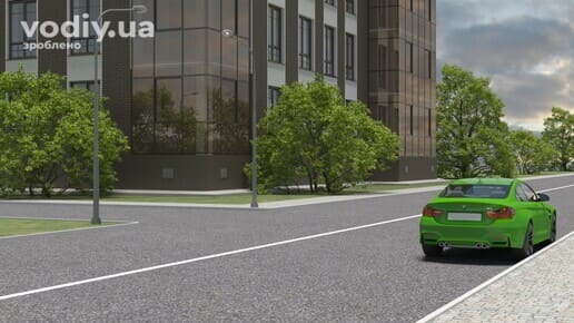 Зупинка на Т-подібному перехресті, горизонтальна дорожня розмітка 1.1 та зелений автомобіль біля краю проїзної частини.